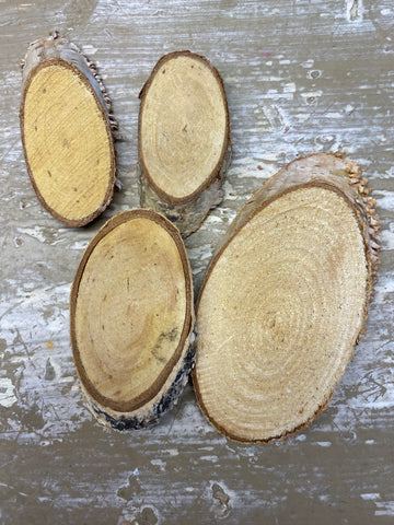 Houtschijfje ongeveer L5 tot 9cm naturel, per 4 stuk