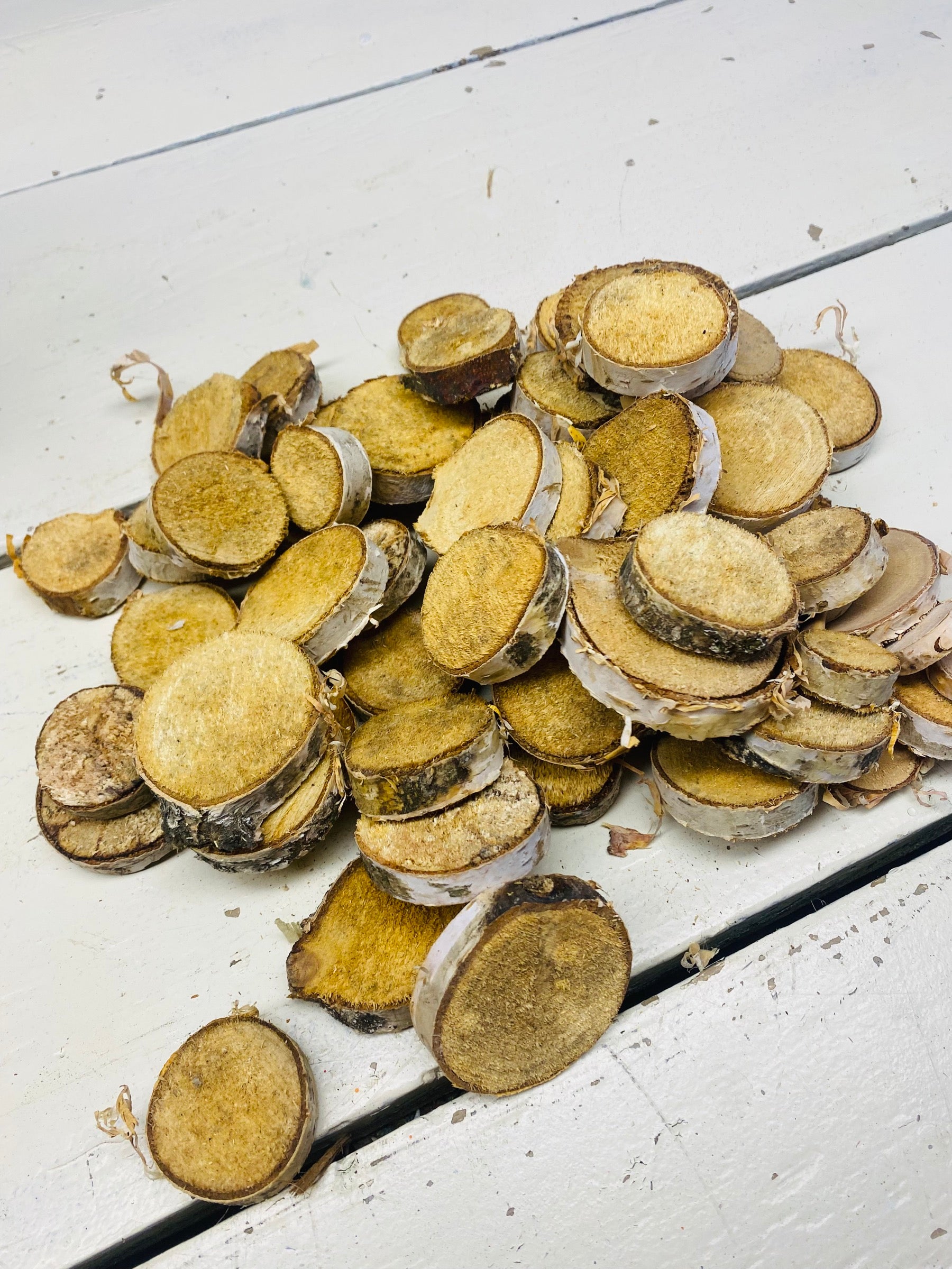 Houtschijfje ongeveer 2 tot 4cm doorsnee naturel, per 500gr.